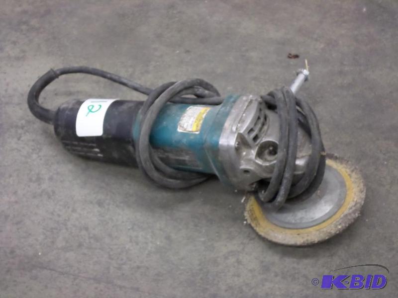 lot 12 image: Makita 4.5" Grinder...