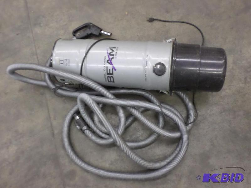 lot 14 image: Beam Central Vac With Hose...