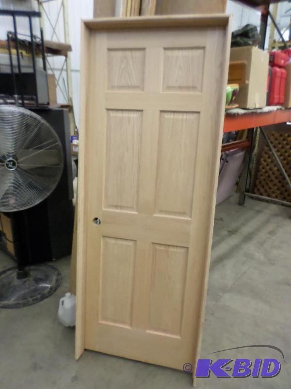 lot 16 image: Unused 32" Wooden Pre-Hung Door...