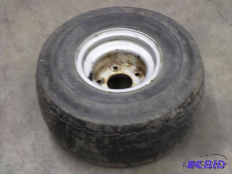lot 34 image: 5-Lug Rim With 18.58.58 Tire...