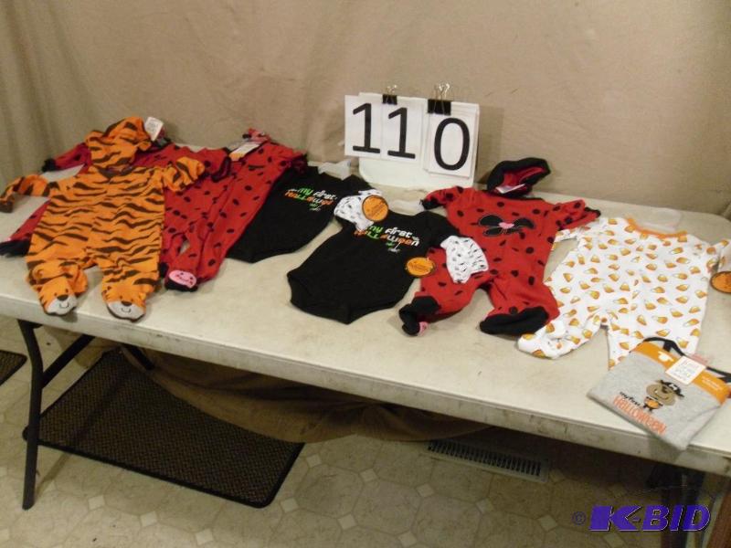 lot 110 image: 8 New Baby Halloween Outfits. Sizes run for 0...