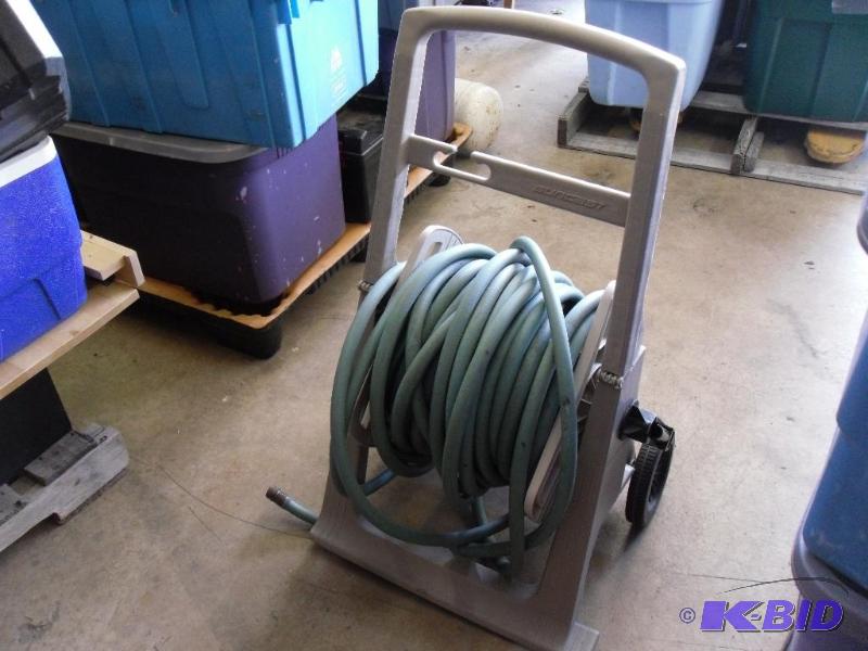 lot 118 image: Suncast Rolling Hose Reel Cart with Hose....