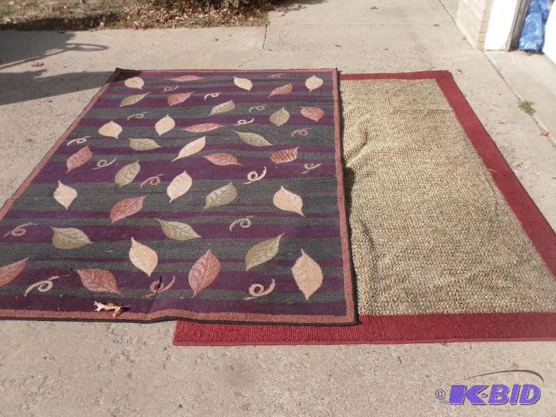 lot 124 image: 2 Large Area Rugs. 5 x 8. Need a little cle...