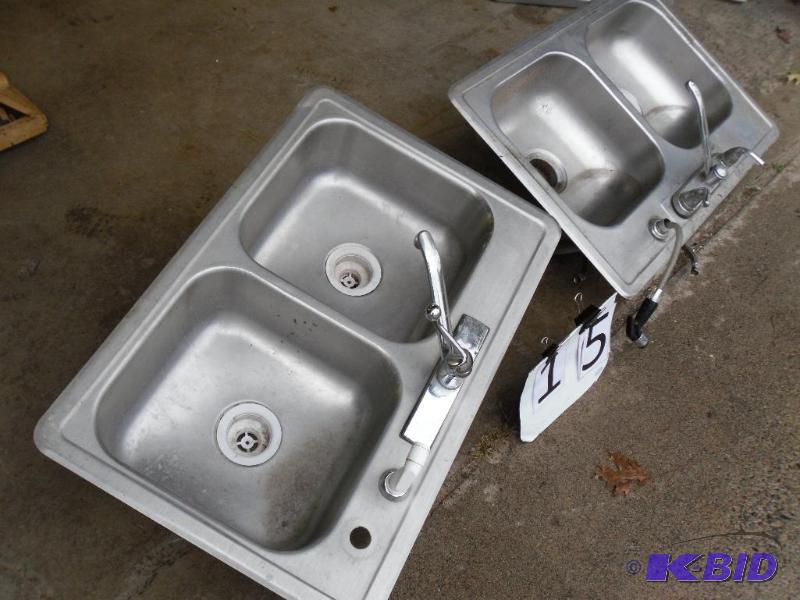 lot 15 image: 2 Stainless Steel Sinks. Need Cleaning....