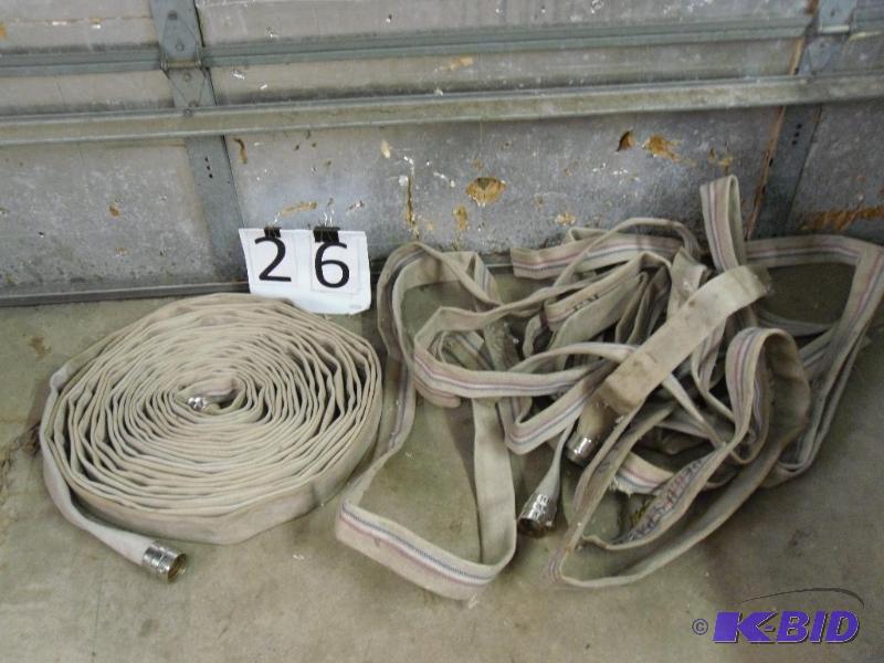 lot 26 image: 2 Heavy Duty Canvas 1.5" Hoses. For cons...