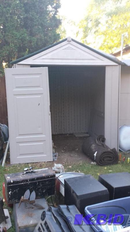 lot 37 image: Rubbermaid Shed. Measures approximately 6 x ...