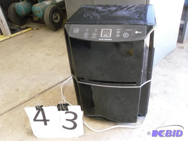 lot 43 image: LG Dehumidifier. Missing one wheel. Digital C...