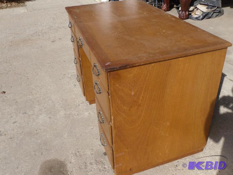 lot 48A image: 9 Drawer Wood Desk. Fronts may need reinforce...