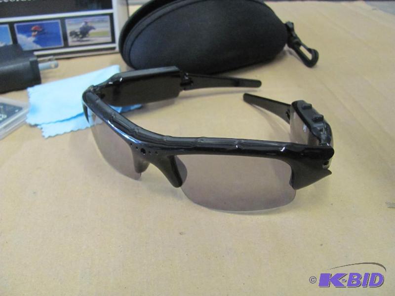 lot 43 image: Check out these cool sunglasses with built-in...