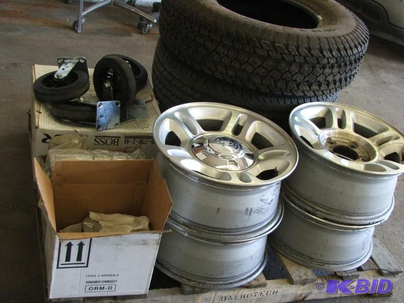 lot 53 image: Aluminum wheels for F150 with center caps and...