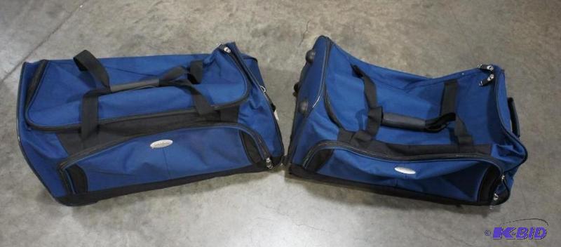 Sampsonite rolling travel duffle bags. (2) to...