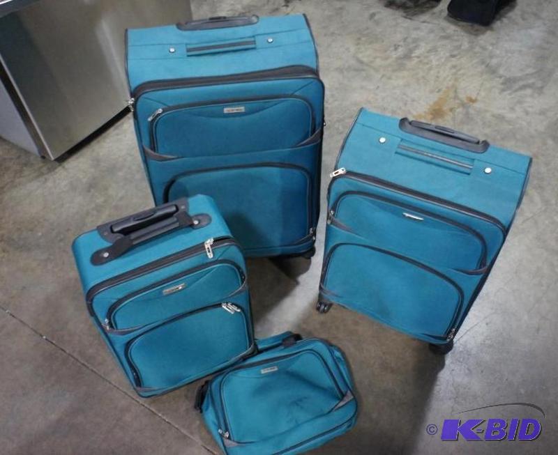 Tag 4pc luggage set. Teal in color  biggest ...