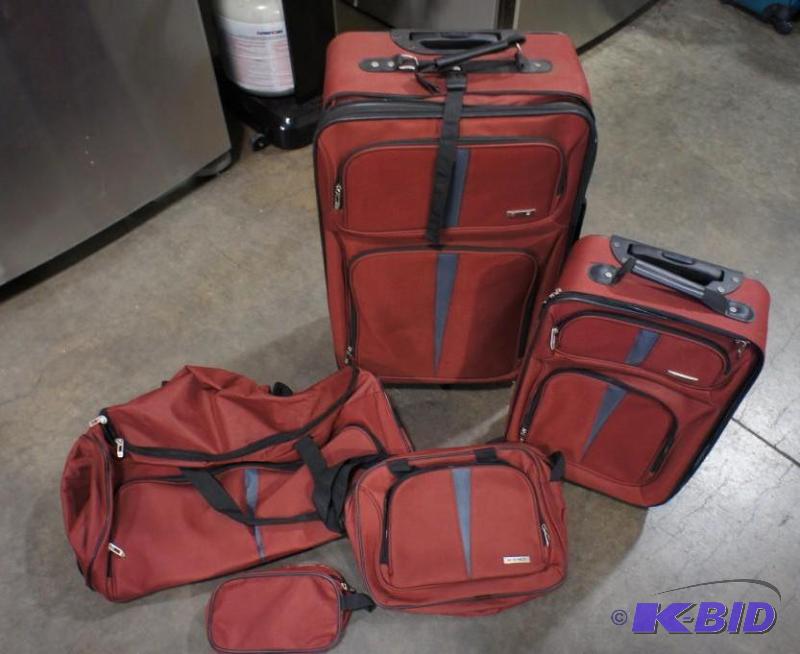 Tag 4pc luggage set. Red in color. Biggest ba...