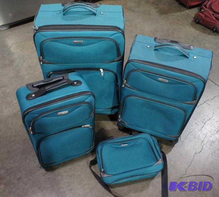 Tag 4pc luggage set. Teal in color  biggest ...