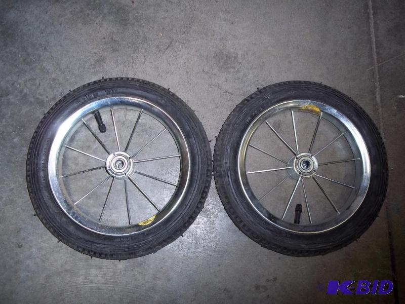 lot 19 image: Pair of 12" Pneumatic spoke wheel...
