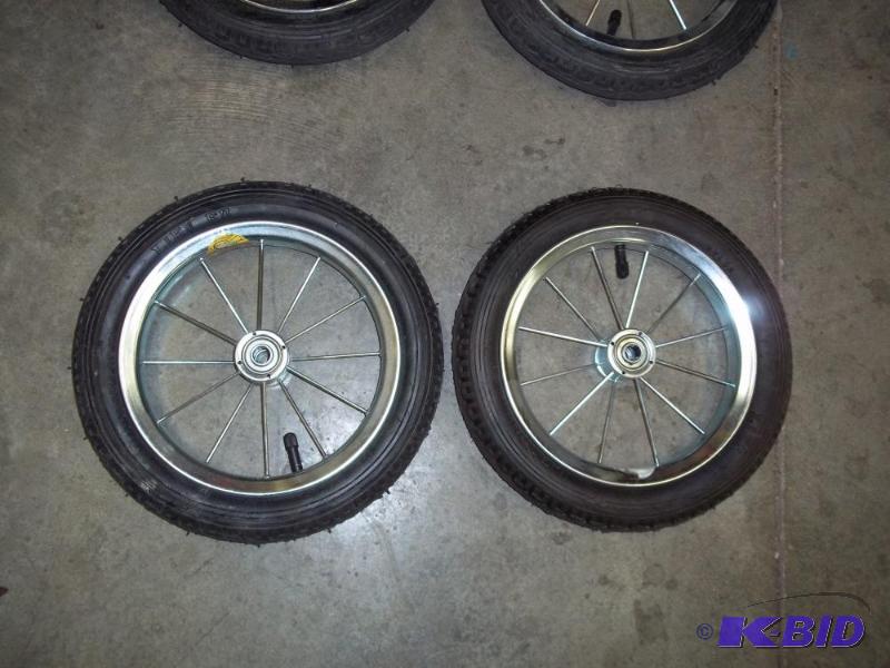 lot 20 image: Pair of 12" Pneumatic spoke wheel...