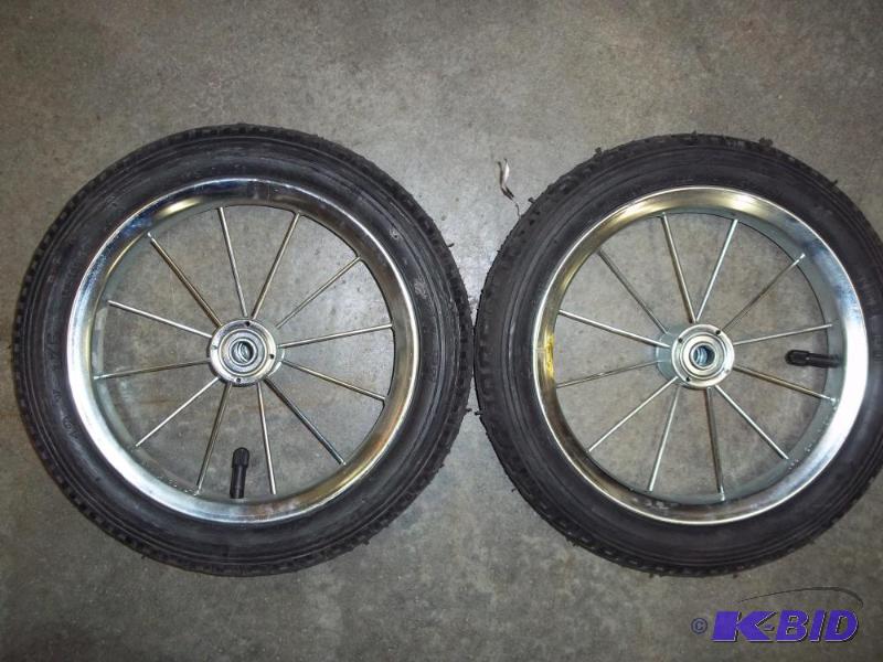 lot 23 image: Pair of 12" Pneumatic spoke wheel...
