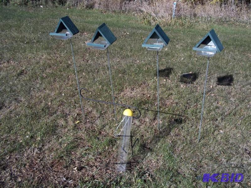 lot 63 image: 4 New bird feeders and&nbspthistle feeder wi...