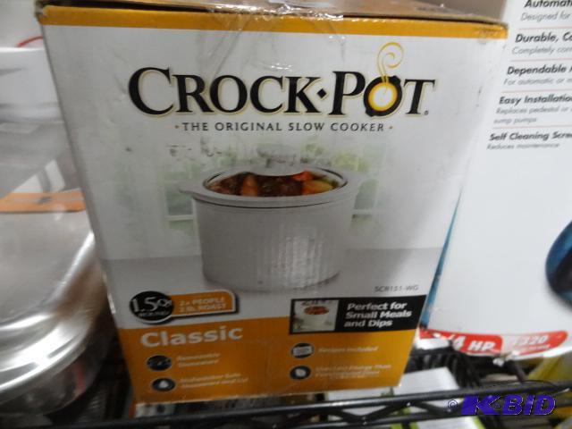 lot 265 image: New in box the original Crock Pot Slow Cooker...