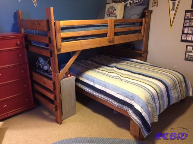 lot 409 image: Used wooden bunk bed twin over full....