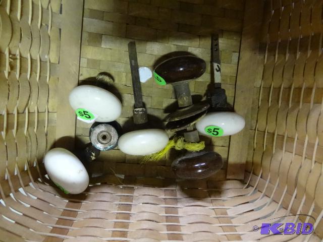 lot 423 image: Wicker basket with six antique ceramic door h...