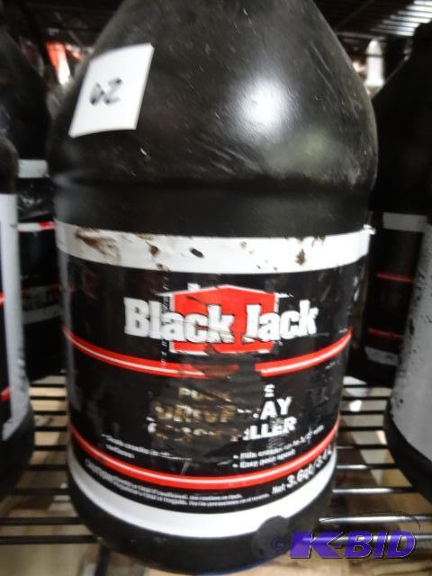 lot 62 image: Qty 2 NEW Black Jack Pourable Driveway Crack ...