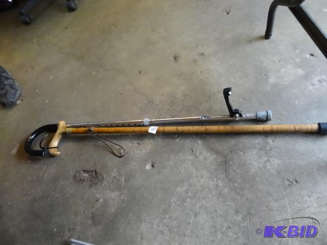 lot 187 image: 2 walking canes. Metal one is adjustable...