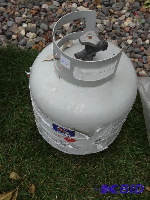 lot 24 image: New style 20 lb propane tank...