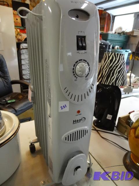 lot 251 image: Heat essentials oil heater. Works...