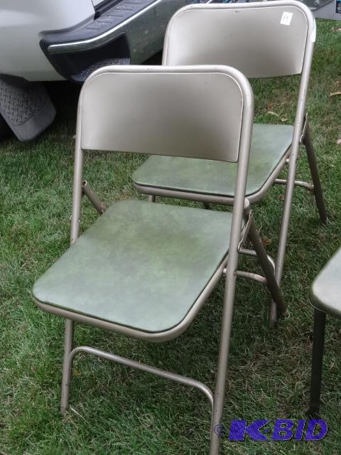 lot 29 image: 2 matching metal folding chairs...