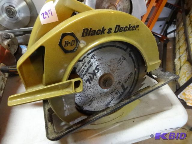 lot 297 image: Black and Decker 7 14 skil saw....
