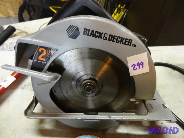 lot 299 image: Black and Decker 7 14 skil saw....