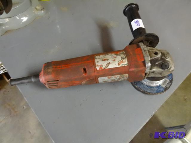 lot 300 image: Milwaukee 4 12 grinder. Needs a new cord...