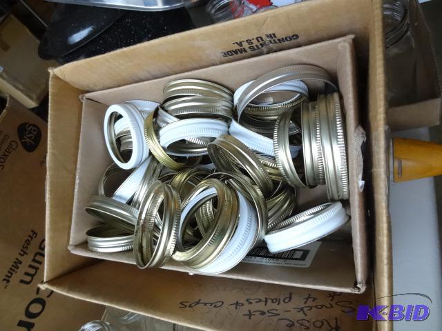 lot 312 image: 2 boxes of caning rings. 2 sizes...
