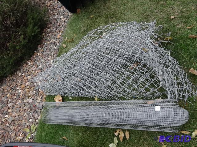 lot 32 image: Chain link fence. Roll of metal hardware clot...