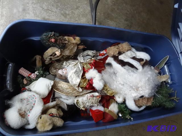 lot 330 image: Rubbermaid 50 gal tote with Christmas decorat...