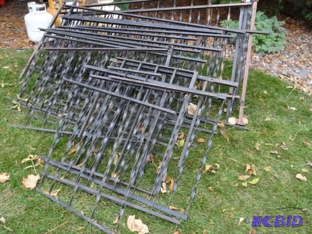lot 38 image: Misc pieces of rod iron railing. Approx 75. ...