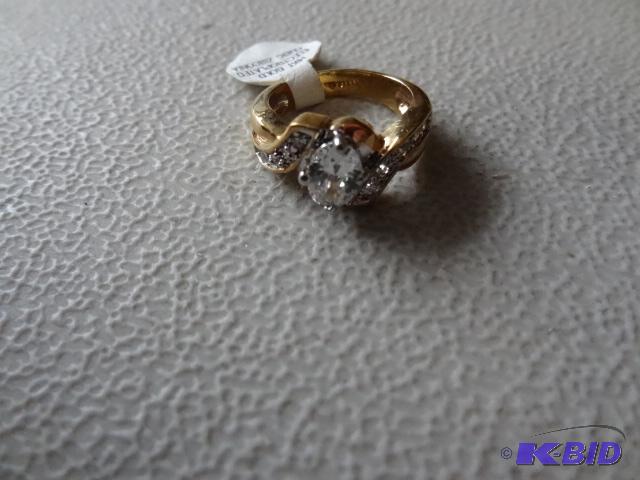 lot 380 image: 14Kt gold electroplated ring. Cubic zirconia ...