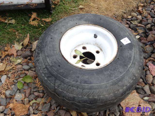 lot 49 image: 18.5 x 8.5-8 tire with 5 hole rim...