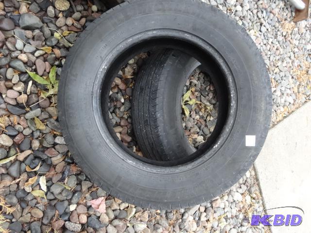 lot 50 image: 215 65R16 michelin tires. Still some life le...