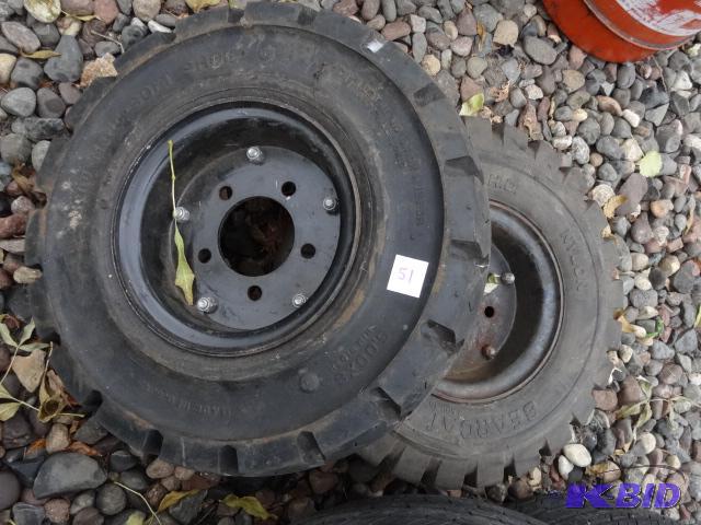 lot 51 image: 2 forklift tires. Solid rubber. 5.00-8. 5 hol...