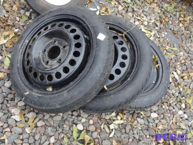 lot 63 image: 3 vehicle spare tires. T12570D15...