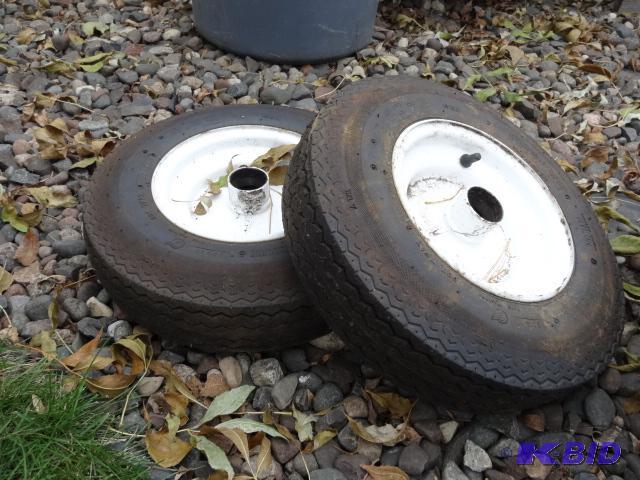 lot 64 image: 2 tires with rims. 4.80-8...