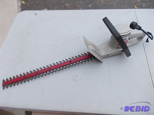 lot 32 image: Craftsman 22 Inch Electric Hedge Trimmer Work...