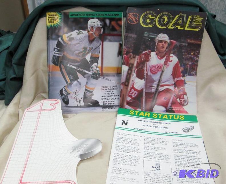 lot 103 image: Minnesota North Stars Magazine #18 Scott Bjug...