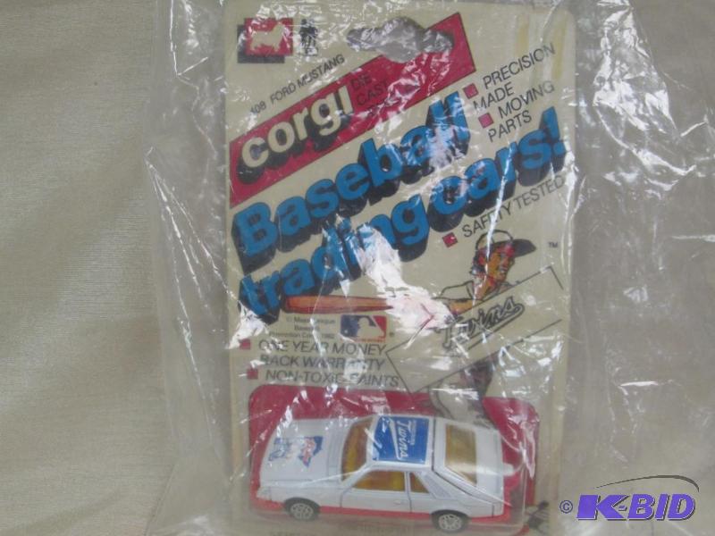 lot 121 image: 408 ford Mustang Corgi die cast baseball trad...