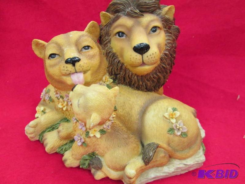 lot 227 image: Mommy, daddy and baby lion it plays a tune Ge...
