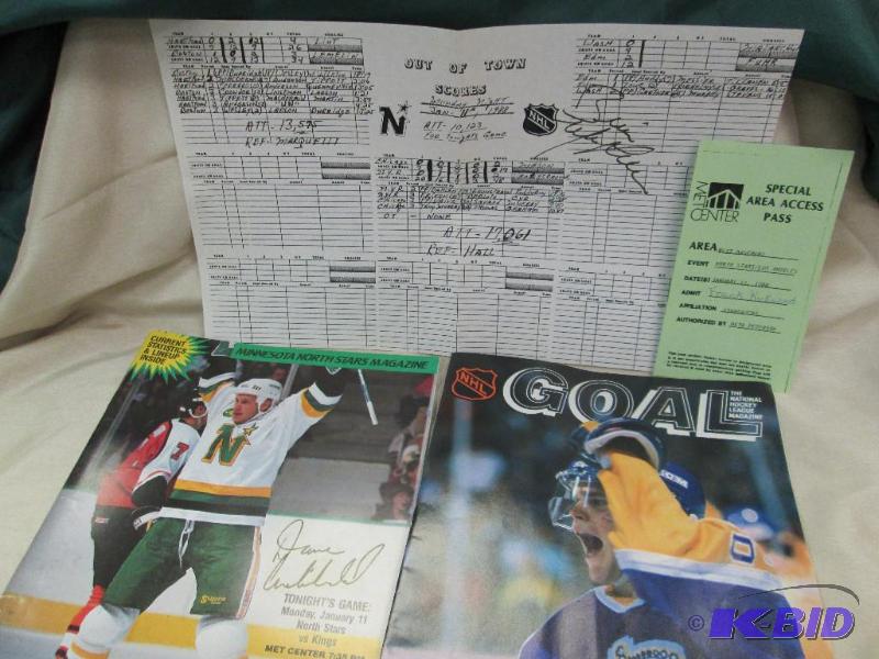 lot 27 image: Minnesota North Stars Magazine Dave Archibald...