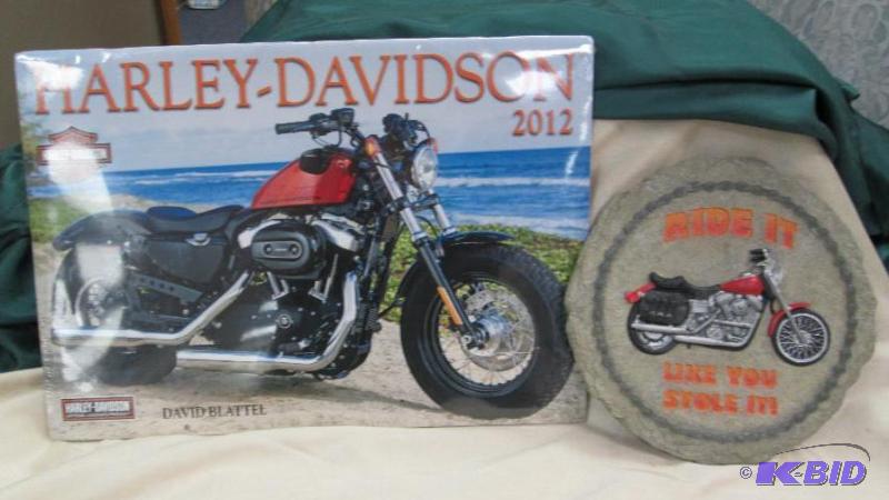 lot 95 image: Harley-Davidson calendar 2012 and a stepping ...