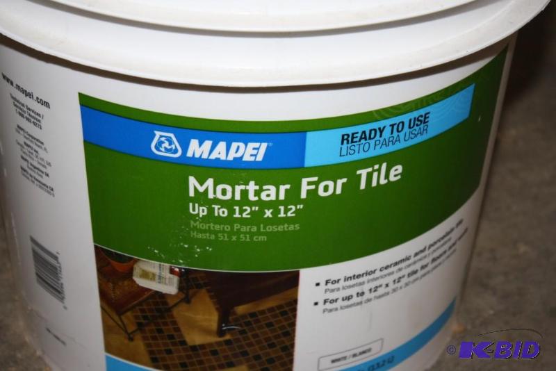 lot 80 image: Bucket of Tile Mortar